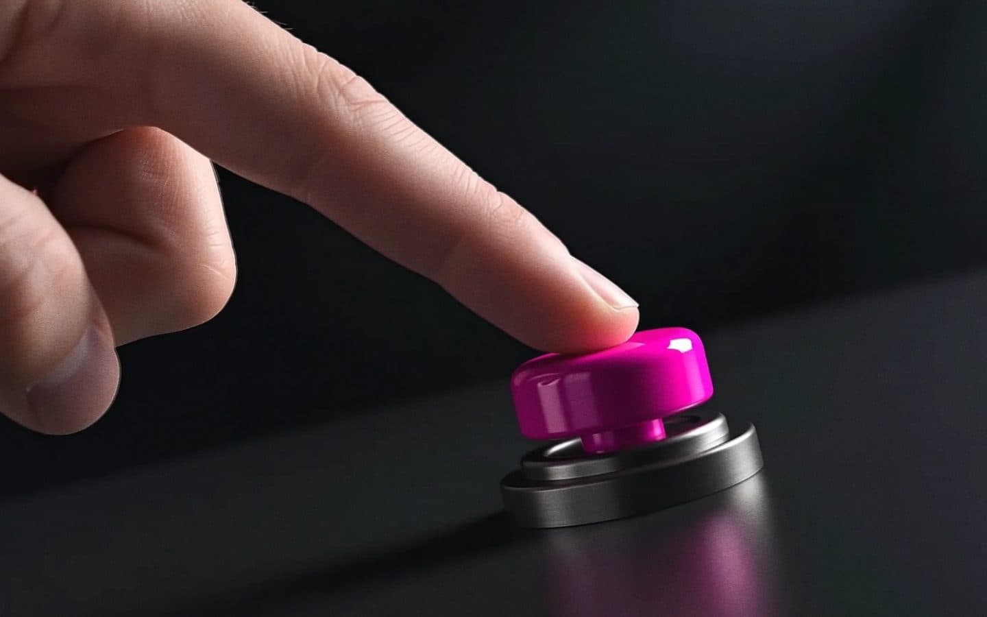 The press: the glyph turns into footage of a finger on the button.